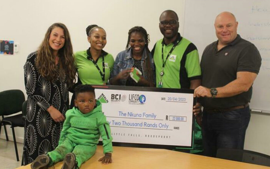 Family of Lisbon Avenue fire receive giant cheque to help with their rebuilding efforts